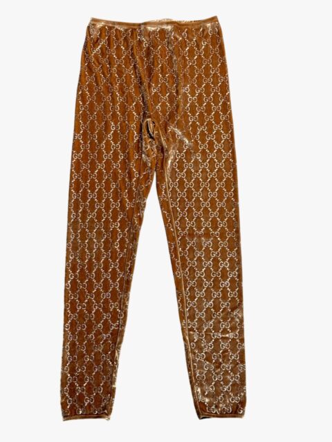 GUCCI – LEGGINGS IN VISCOSA COLOR MIELE DORATO CON MOTIVO GG STRASS – TG. L